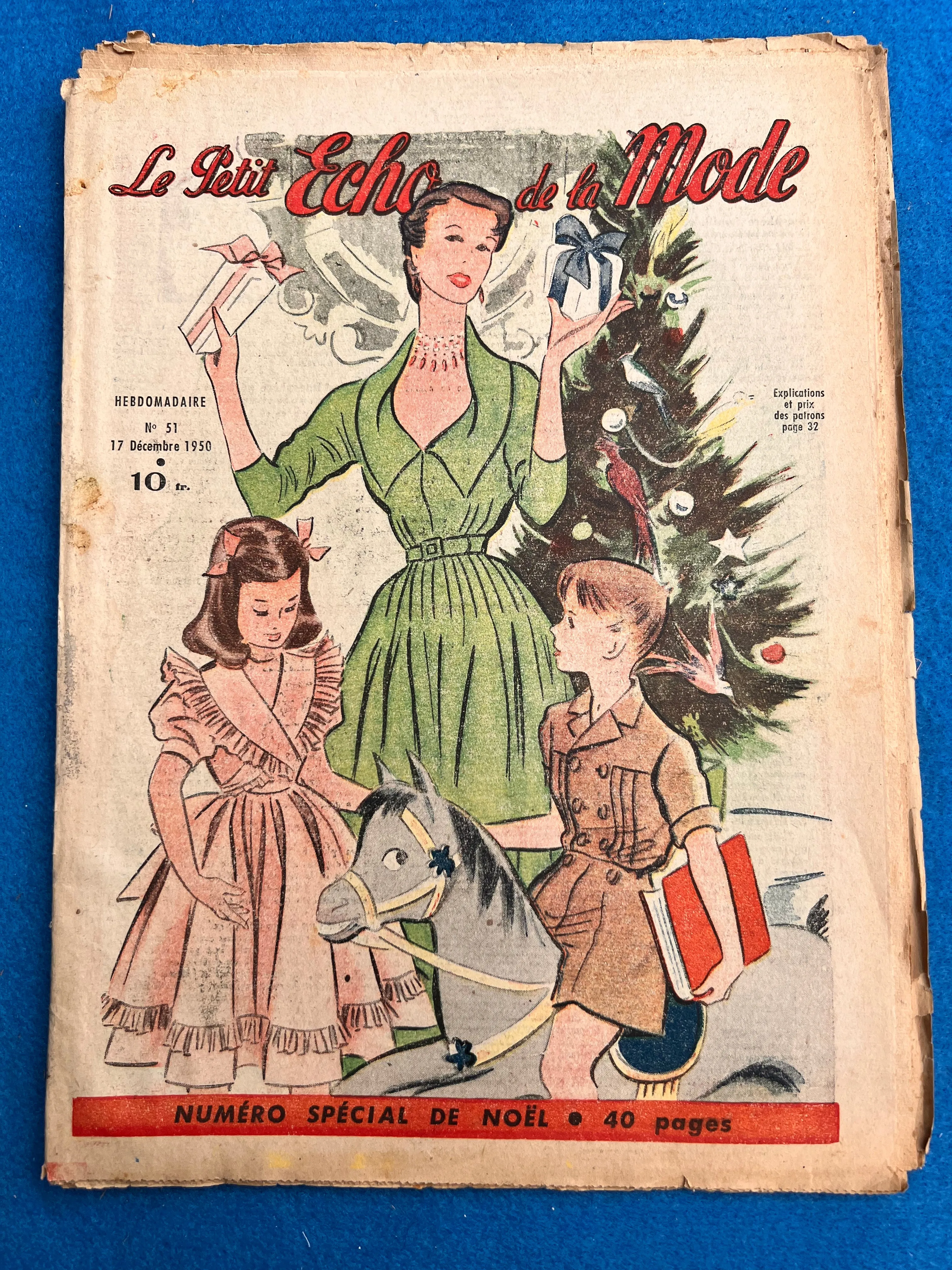 Full of Christmas Cheer in December 1950 issue of French Petit Echo de la Mode