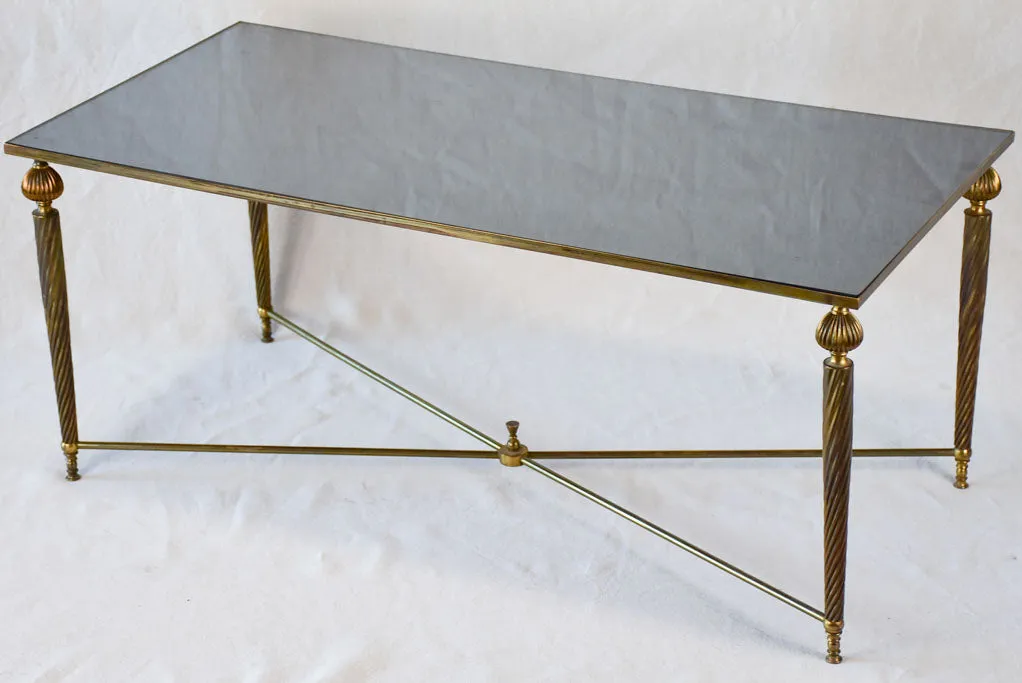 Mid century glass and brass coffee table with twisted tapered legs 39½" x  19¼"